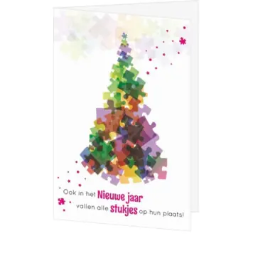 Kerstkaart met kleurrijke kerstboom van puzzelstukjes