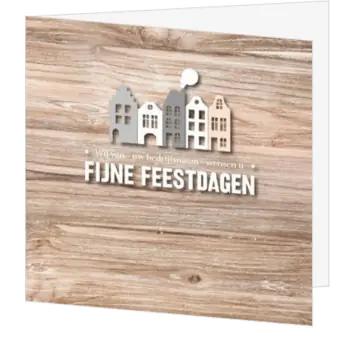 Kerstkaart met houten achtergrond en rijtje huizen