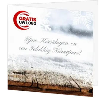 Kerstkaart met sneeuwvlokken en houten achtergrond