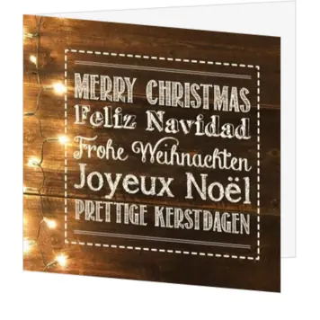 Typografische kerstkaart op hout met kerstgroeten