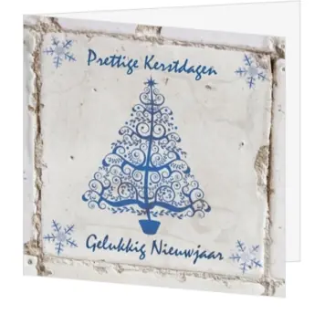 Blauwe kerstkaart met sierlijke kerstboom