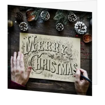 kerstkaart met handgetekende Merry Christmas op kraftlook