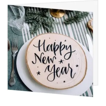 kerstkaart met Happy New Year op gedekte tafel
