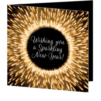 kerstkaart met gouden lichtexplosie en nieuwjaarswens