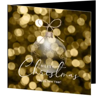 kerstkaart met transparante kerstbal en wereldkaart