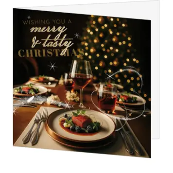 kerstkaart met stijlvol kerstdiner en gouden lichtjes