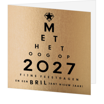 Kerstkaart met gouden achtergrond en typografisch ontwerp