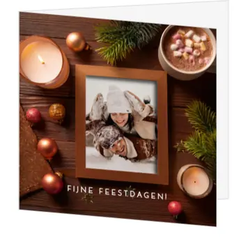Warme kerstkaart met fotolijst en eigen foto